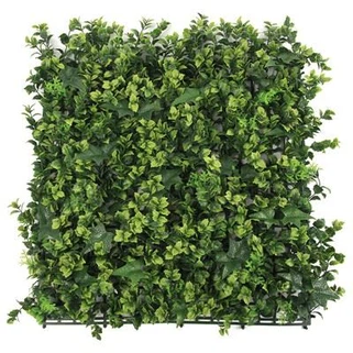 Erba del giardino artificiale del pozzo