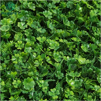 Parete verde del giardino decorativo dei pannelli delle stuoie della siepe di bosso artificiale