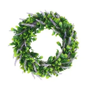 Corone di erba di bosso artificiali conservate